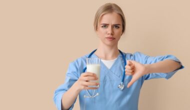 Female Doctor Glass of Milk Thumbs Down