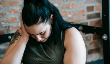 Woman looking sad at the gym