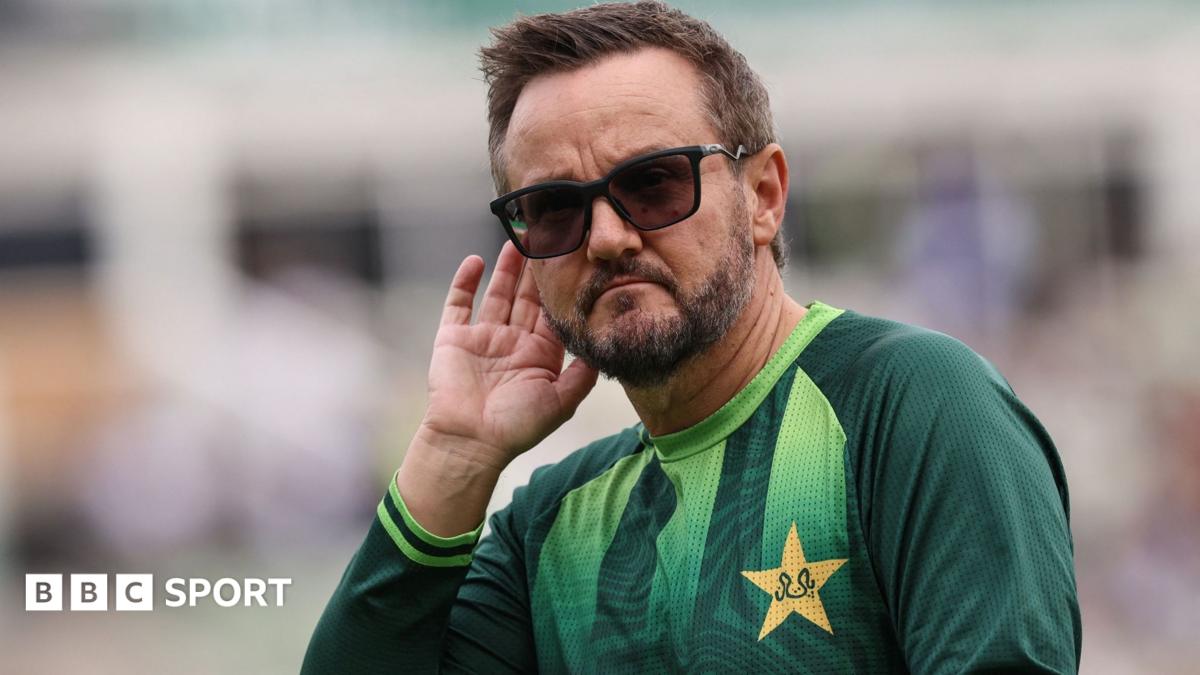 Mike Hesson cups his ear during a training session with Pakistan's Test side during their tour of England