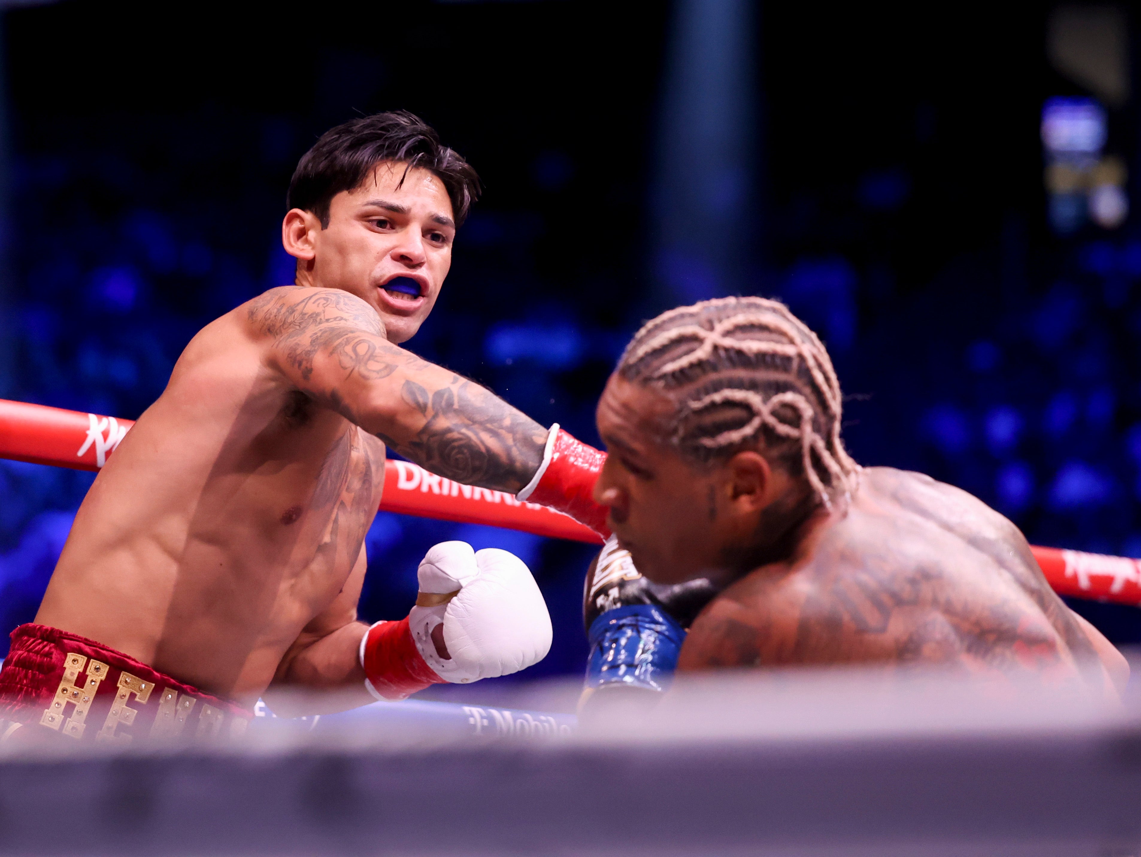 Garcia dropped Benn with a huge right hook in round two