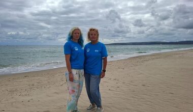 East Dorset Open Water Swimming Club have blamed Wessex Water for sewage discharges off Blue Flag beach in Poole, Dorset, following heavy rain (swimmers are pictured)