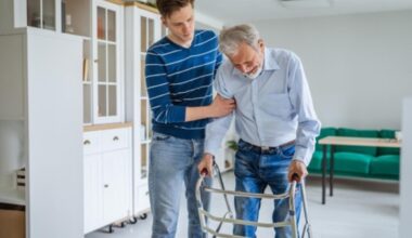 Son caring for father