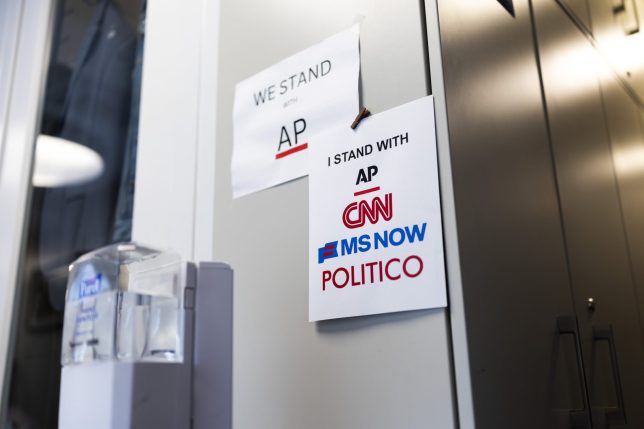 WASHINGTON, DC - SEPTEMBER 21: Signs of support for AP, CNN, MS NOW and POLITICO hang on the White House grounds on September 21, 2026 in Washington, DC. Reporters from MS NOW, CNN, and Politico have been blocked from accessing the White House since September 19th after President Trump said he was banning the three outlets from the property. Those news organizations are now suing President Trump, alleging that it violates the First Amendment. (Photo by Finn Gomez/Getty Images)