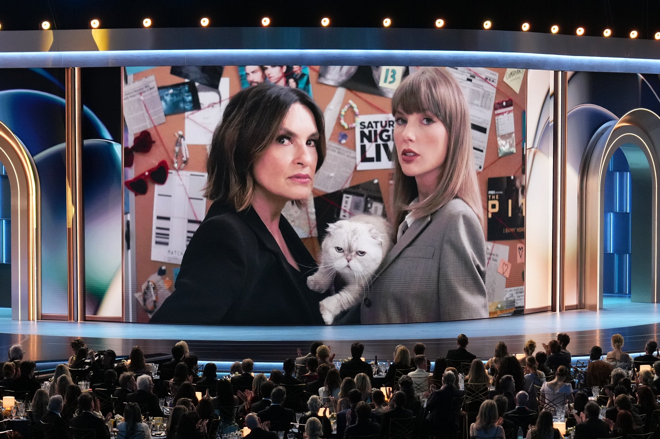 Taylor Swift, right, appeared alongside host Mariska Hargitay in a pre-taped Emmys skit