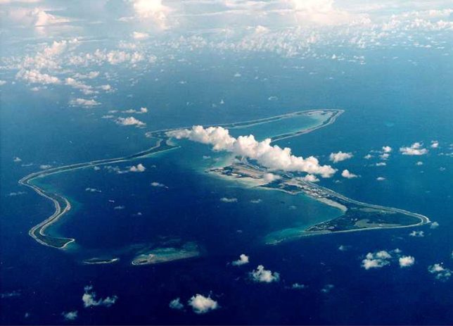 FILE PHOTO: An undated file photo shows Diego Garcia, the largest island in the Chagos archipelago and site of a major United States military base in the middle of the Indian Ocean leased from Britain in 1966. REUTERS/HO/U.S. Navy/File Photo