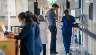 Swinney rules out compulsory redundancies in NHS shake up