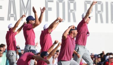 Sep 27, 2026; Medinah, Illinois, USA; Member of the U.S. Team celebrate the match victory by Jackson Koivun on the 18th green during the final round of the Presidents Cup.