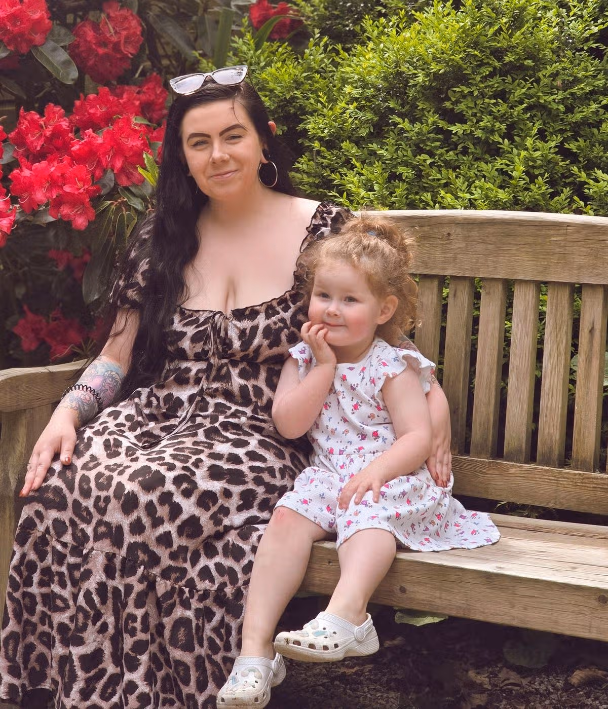 Courtney and Penny sitting on a bench