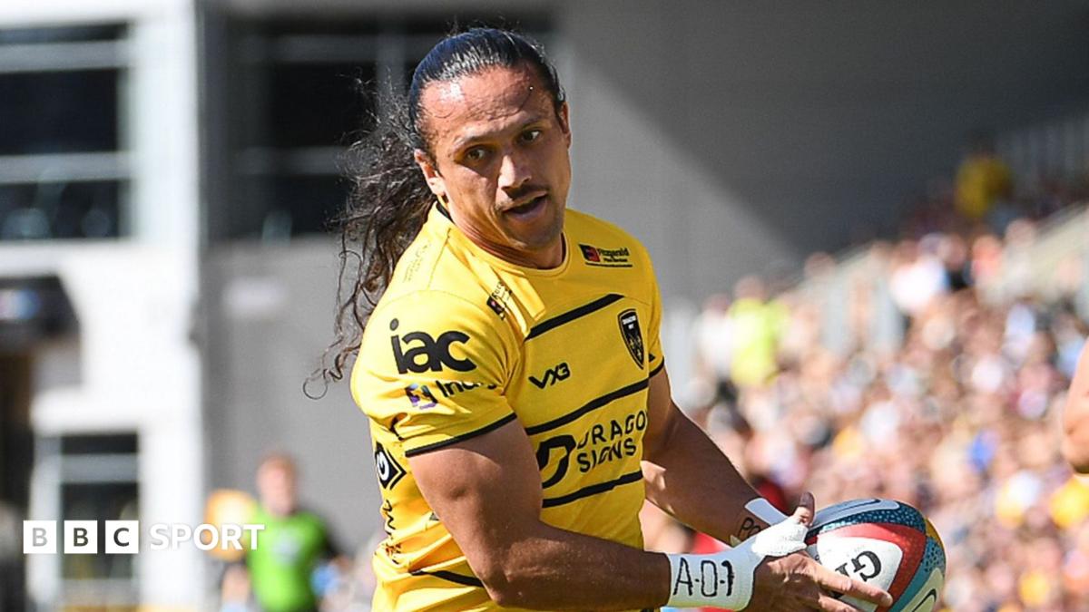 Ereatara Enari runs in a try for Dragons against Hartpury at Rodney Parade