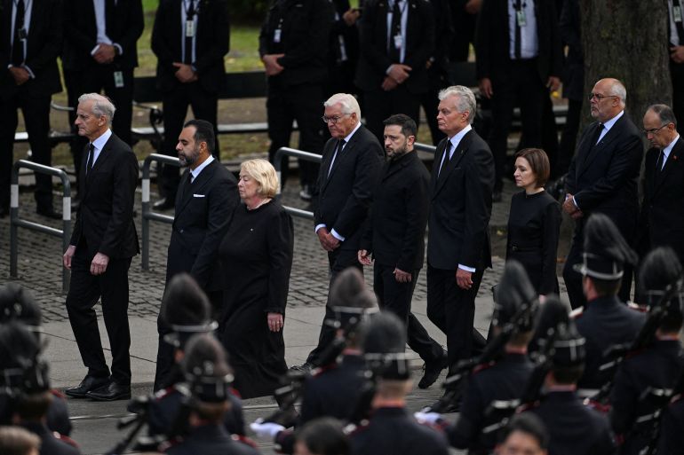 Ukraine’s President Volodymyr Zelenskyy, German President Frank-Walter Steinmeier, Lithuania’s President Gitanas Nauseda and Moldova’s President Maia Sandu walk during King Harald V’s funeral procession in Oslo