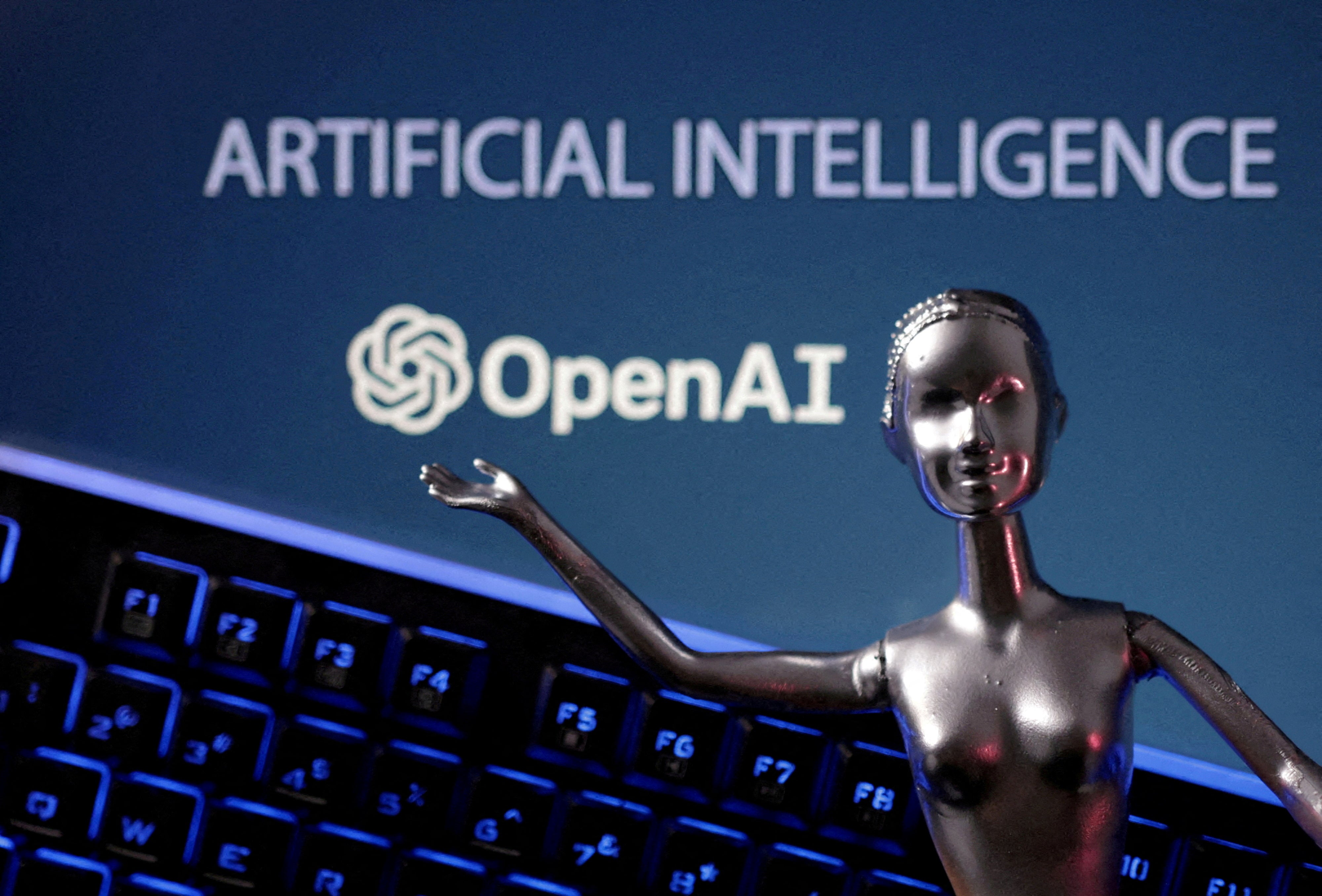 OpenAI logo and AI Artificial Intelligence words are seen in this illustration taken