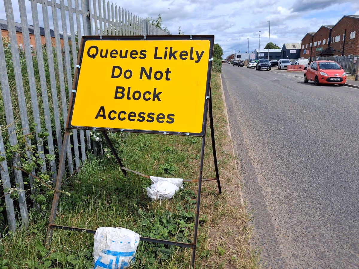 Signs warn 'queues likely' around Lincoln's recycling centre on Great Northern Terrace
