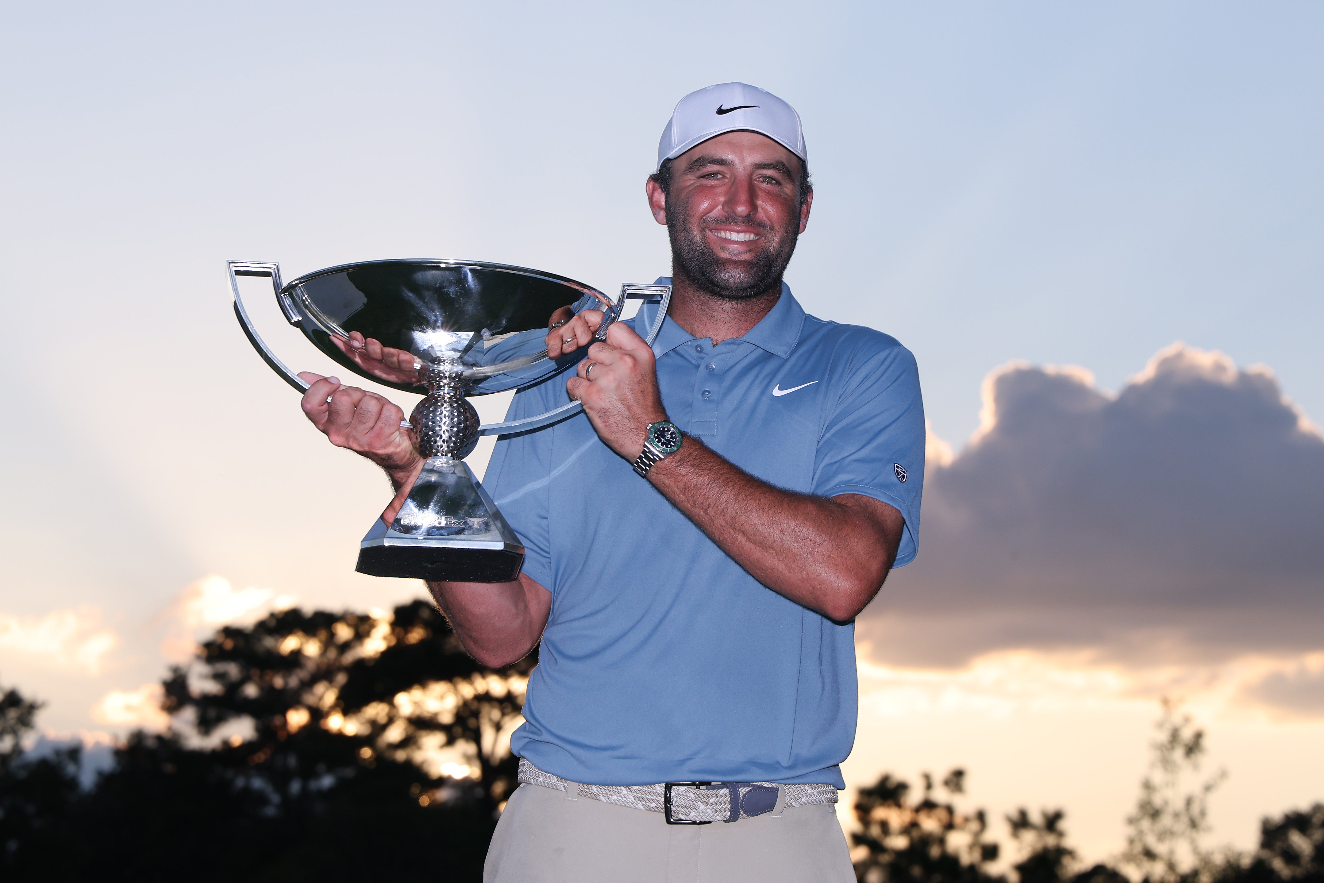 Scottie Scheffler of the United States poses with the trophy after winning the final round of the TOUR Championship 2026 at East Lake Golf Club on August 30, 2026 in Atlanta, Georgia