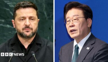 Composite image of Ukrainian President Volodymyr Zelensky, who has short dark hair, facial hair and is wearing a black shirt and jacket, and South Korean President Lee Jae Myung, who has short black hair and is wearing a white shirt, grey jacket and teal tie.
