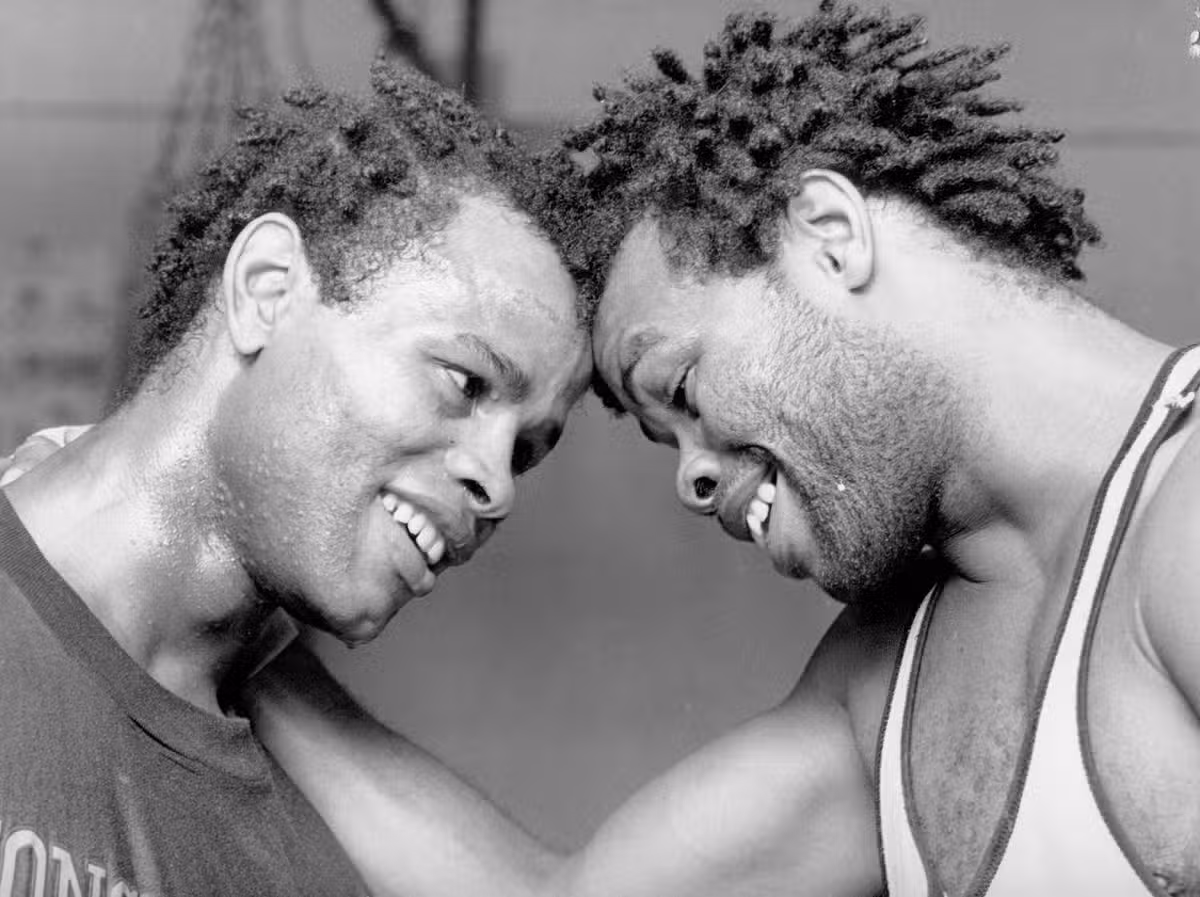 Tony (left) is pictured with his brother and fellow professional boxer Kirkland in 1987