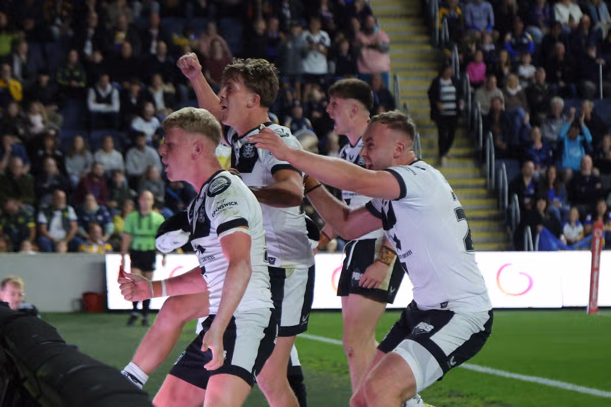 Hull FC young gun Lloyd Kemp celebrates his try.