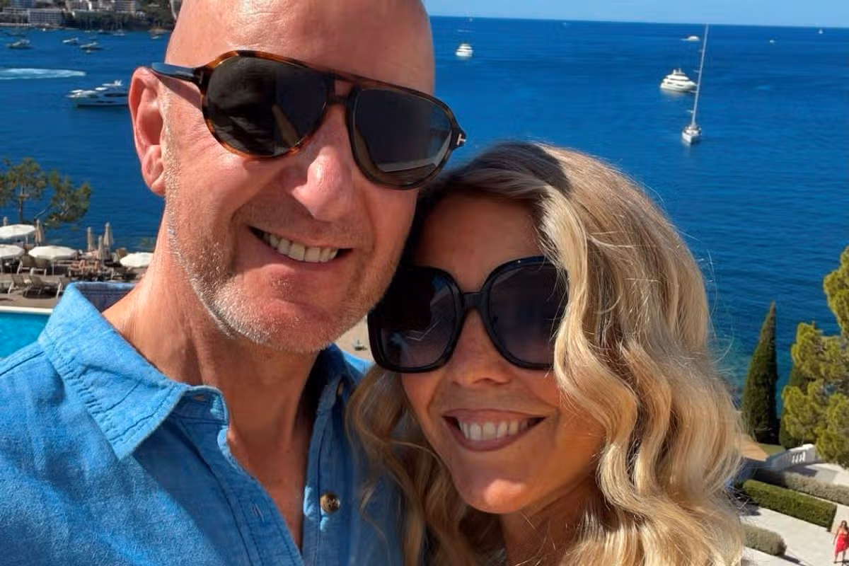 A smiling couple on holiday somewhere sunny
