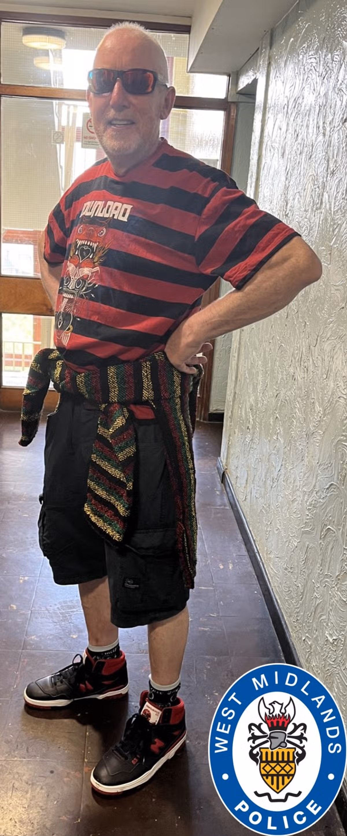 Family photo of grandfather, Maurice Middleton, 65, who was white and had greay hair and a greay beard and is pictured wearing sunglasses, a black and red striped top, shorts and black and red trainers