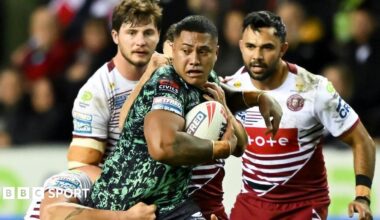Leigh Leopards and Wigan Warriors face off in a Super League match