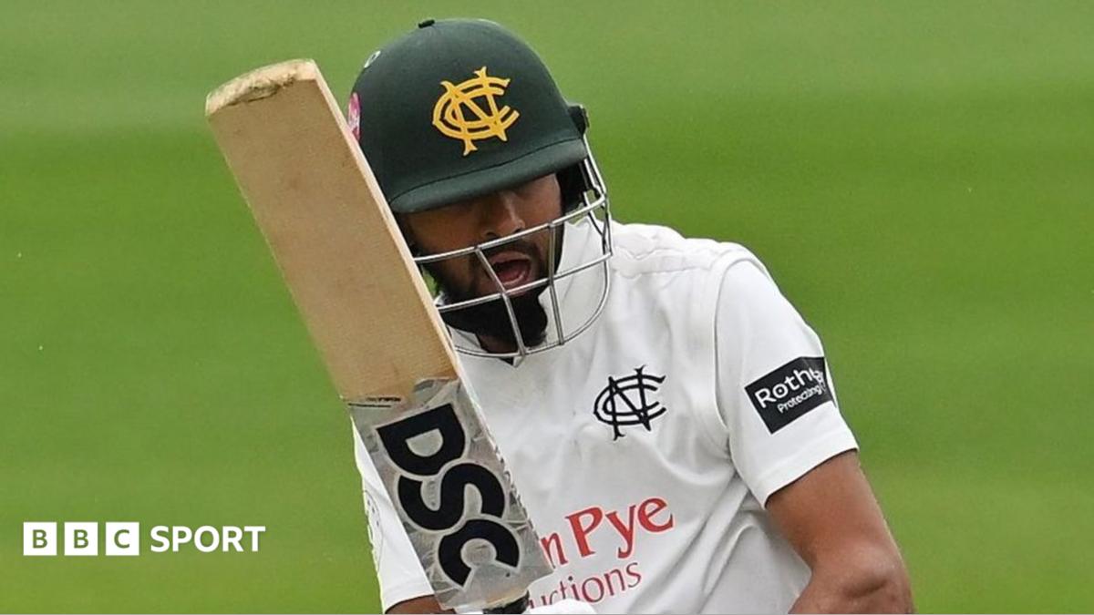 Haseeb Hameed in action for Nottinghamshire against Leicestershire, wearing the green Notts helmet as he play a shot through the leg-side