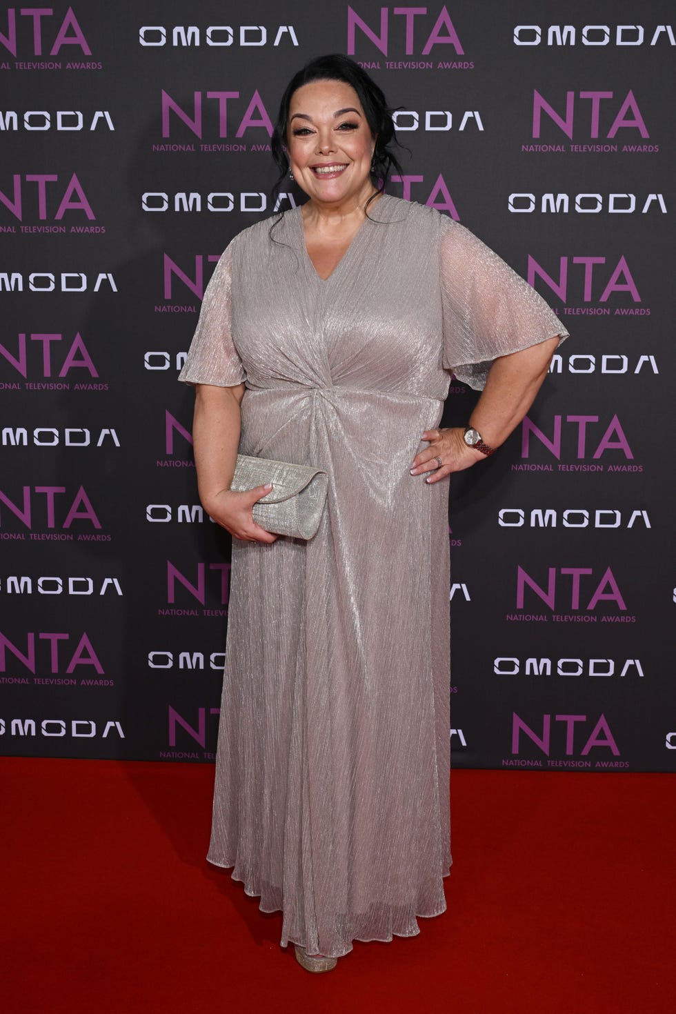 Lisa Riley, NTAs 2026 lisa riley in a sparkling gown on a red carpet at the national television awards.