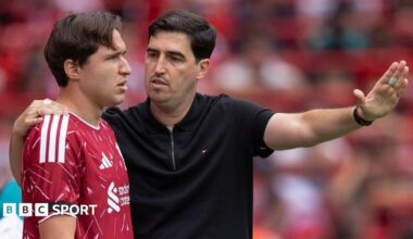 Liverpool manager Andoni Iraola talks to Federico Chiesa