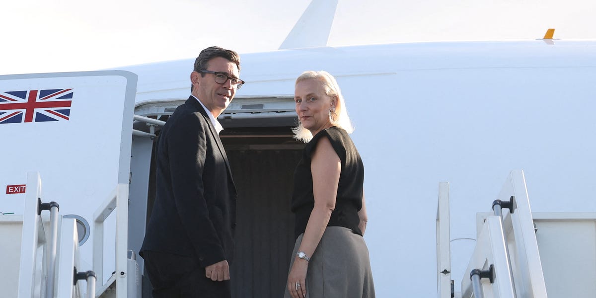 Andy Burnham's Wife, Marie-France van Heel, Nails Autumn Dressing In Asymmetric Wrap Midi Skirt. Get The Look
