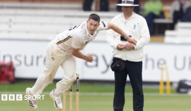 Matthew Potts in whites in his delivery stride for Durham