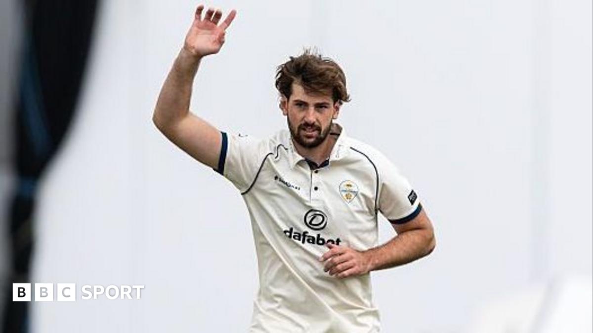 Derbyshire fast bowler Ben Aitchison celebrates another wicket