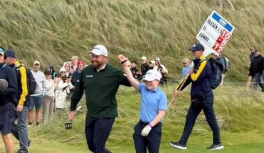 Athenry's Cillian Hirst with newly minted Amgen Irish Open champion Shane Lowry at Doonbeg.