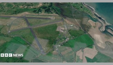 The Former Llanbedr Airfield Site, fields and the river are visible.