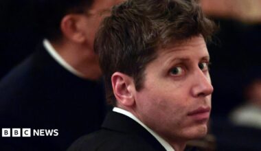 OpenAI CEO Sam Altman sitting at a dinner at the White House.