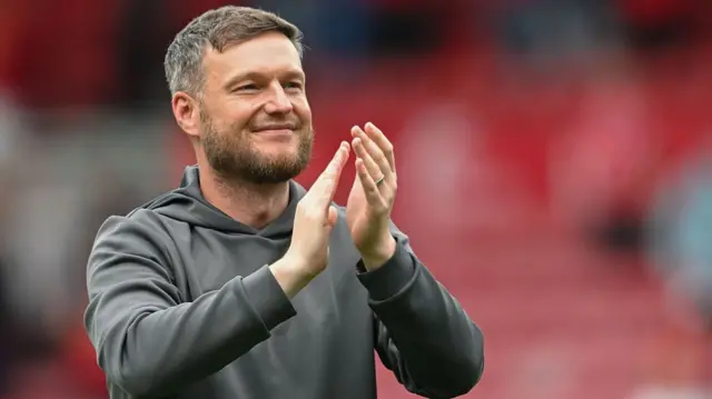 Boro boss Kim Hellberg applauds supporters