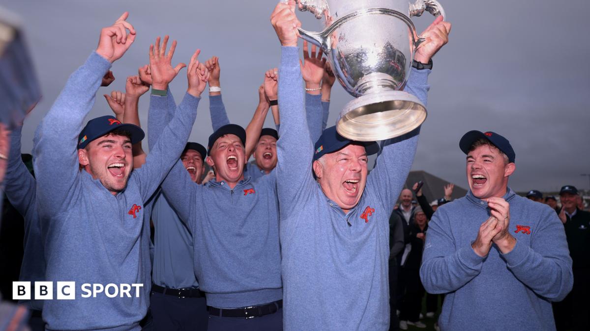 Dean Robertson lifts the Walker Cup
