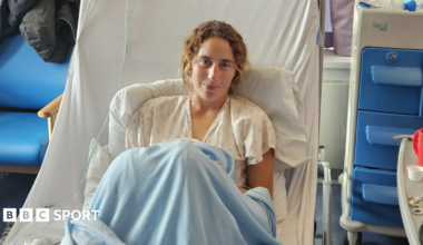 Jackie Bachteler sitting up in a hospital bed