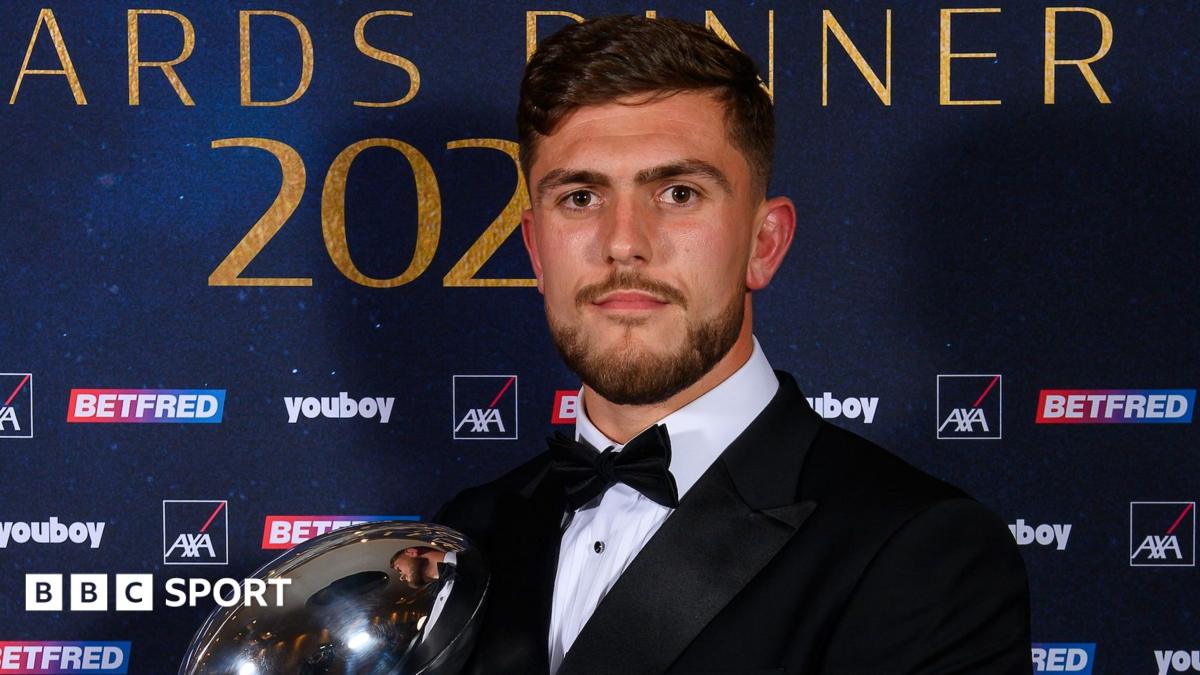 Brad O'Neill of Wigan Warriors poses with a trophy at the RFL Awards dinner