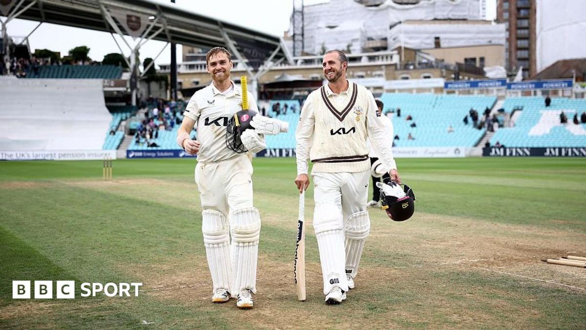 Josh Blake and Dan Worrall walking off the field