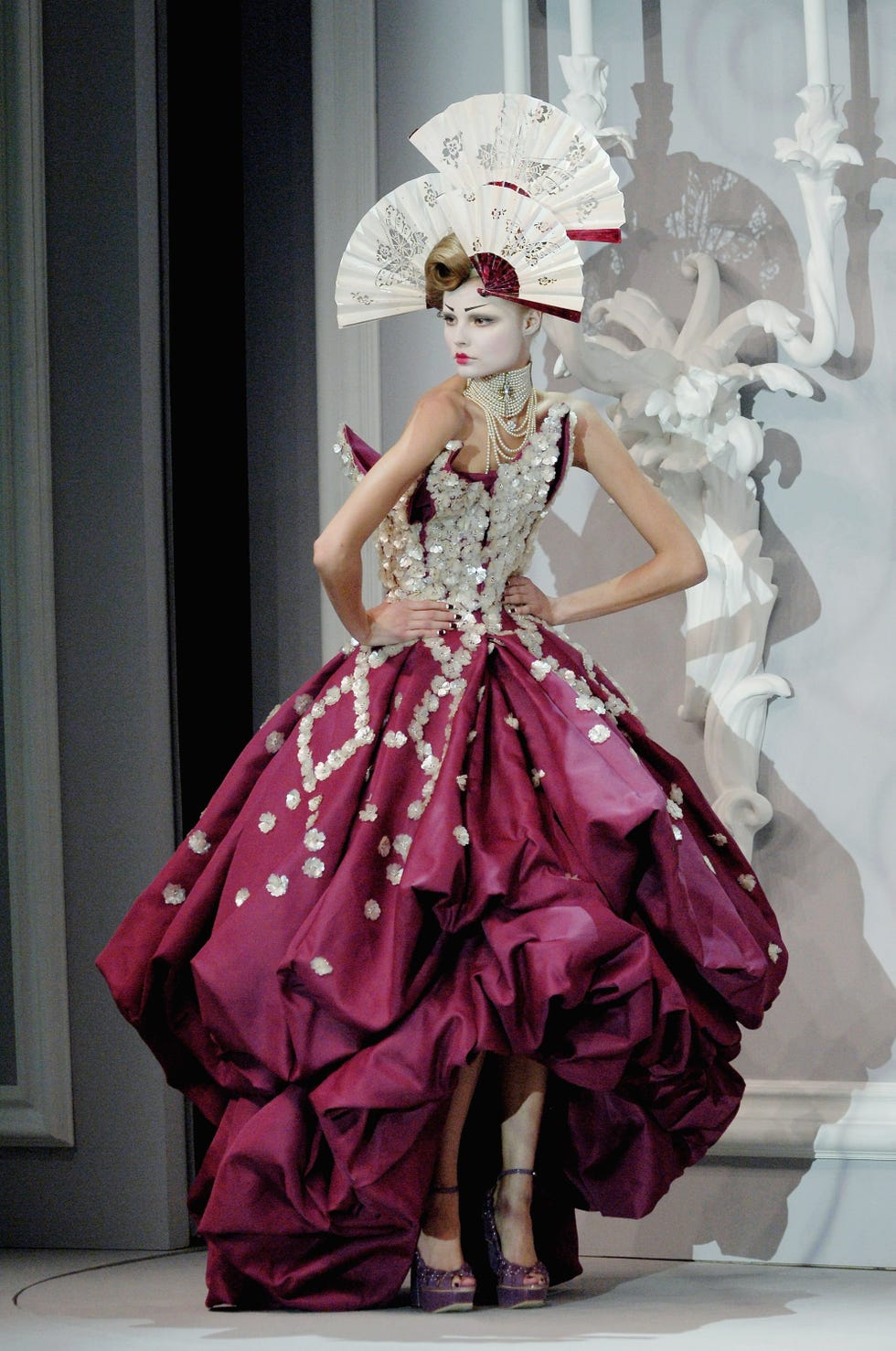 paris january 22 uk out a model walks down the catwalk during the christian dior fashion show as part of spring  summer 2007 haute couture on january 22, 2007 in paris, france photo by chris moorecatwalkinggetty images