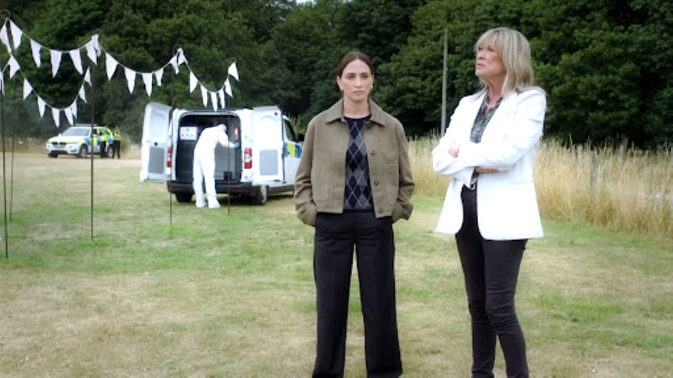 emmerdale ds ramsden kim tate two women standing in a field near a forensic van and police officers