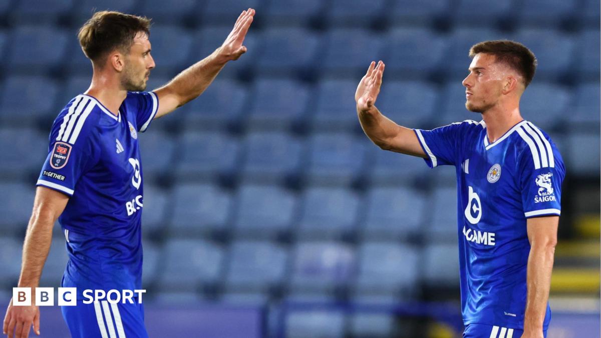 Admir Bristric high-fives Leicester teammate Luke Thomas after scoring against Fulham