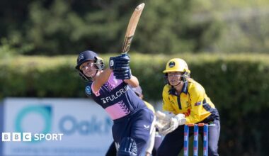 Middlesex opener Artemis Downer plays a big shot against Glamorgan
