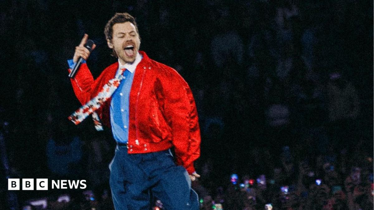 Harry Styles on stage in Wembley