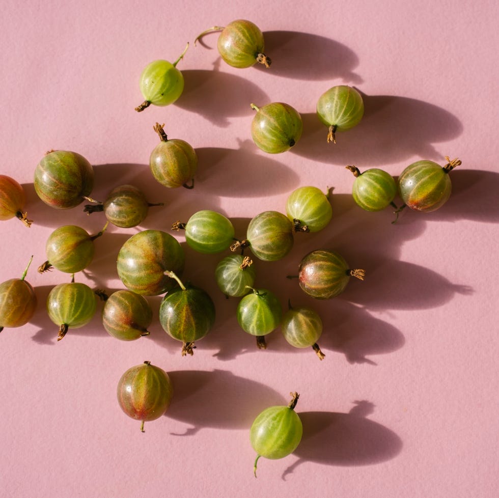 Gooseberry fruits on pink background gooseberry fruits on pink background