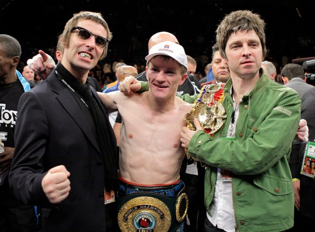 Ricky Hatton, of England, celebrates with English rock group Oasis members Noel Gallagher, right, and Liam Gallagher, left, after defeating Paulie Malignaggi in a 12-round junior welterweight boxing match in Las Vegas, Saturday, Nov. 22, 2008. Hatton won by TKO in the 11th round. (AP Photo/Jae C. Hong)