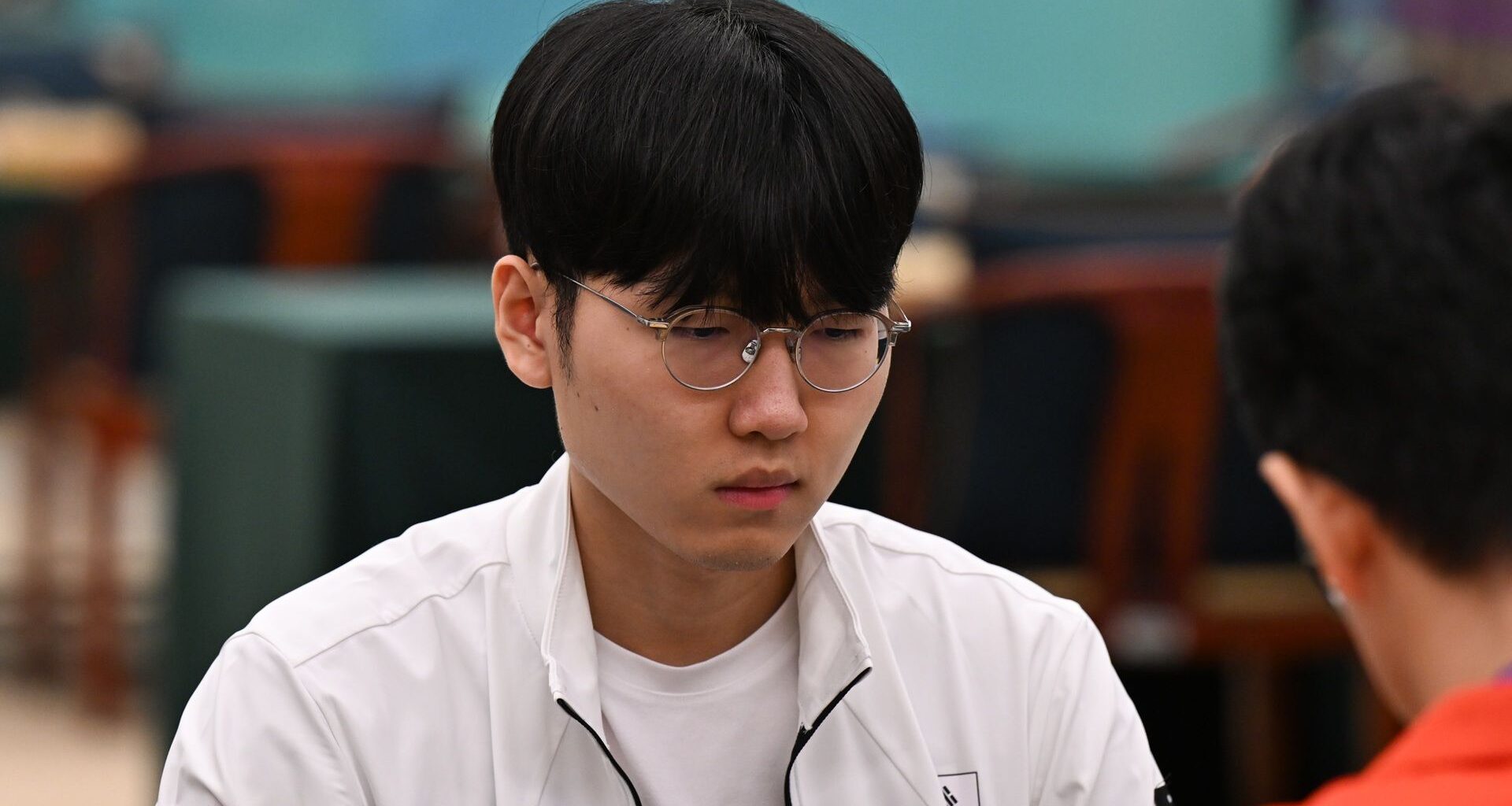 HANGZHOU, CHINA - SEPTEMBER 28: Ryo Ichiriki of Team Japan competes against Shin Jin-seo (L) of Team South Korea in the Go - Men's Individual Bronze Medal Match on day five of the 19th Asian Games at Hangzhou Qi-Yuan (Zhili) Chess Hall on September 28, 2023 in Hangzhou, Zhejiang Province of China.