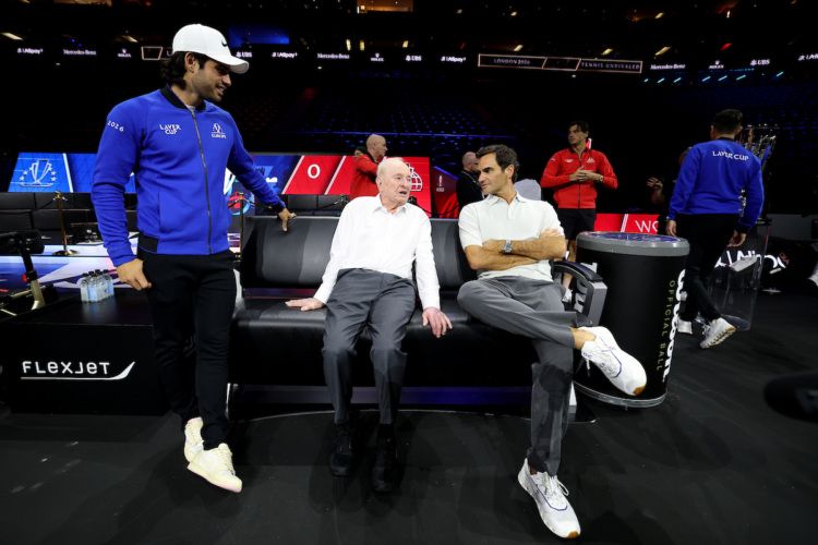 Roger Federer chats with Rod Laver and Carlos Alcaraz at The O2 on Wednesday. 