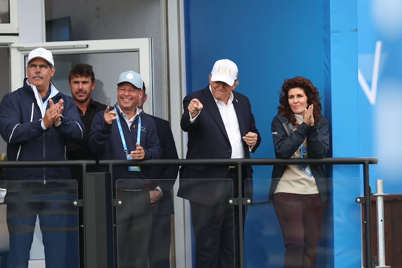 US president Donald Trump points to Rory McIlroy as he finishes his round as he watches the Irish Open at Trump International Golf Links & Hotel in Doonbeg. Photograph: Damien Eagers/PA Wire