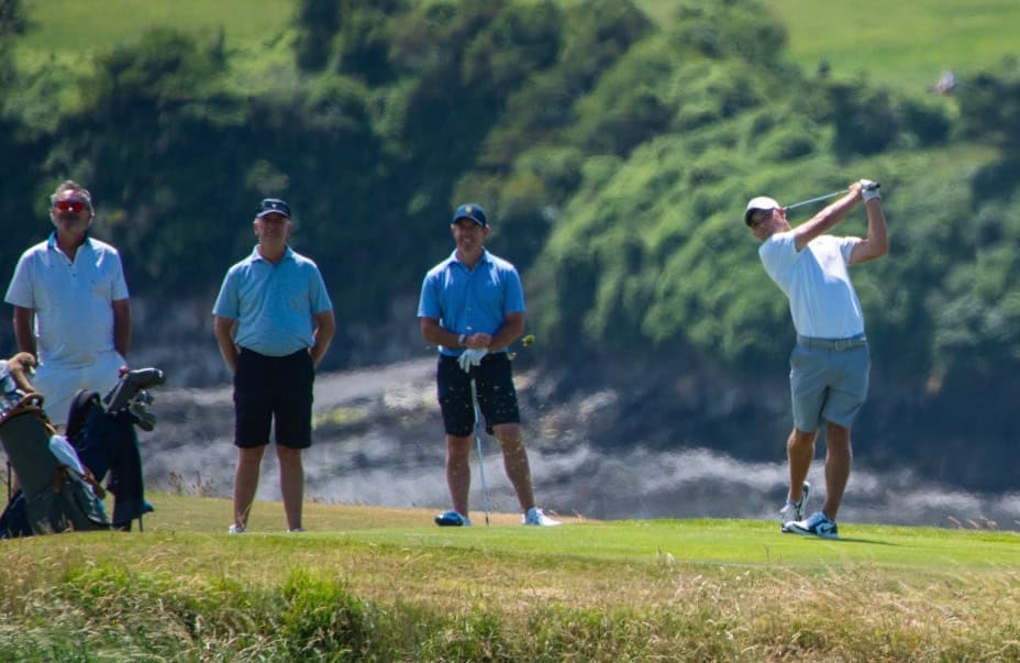 Finn Ellis hits as Rory McIlroy watches at St Enodoc | Source: Finn Ellis Rory McIlroy at St Enodoc