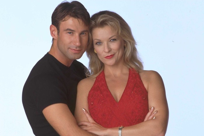Claire King & Paul Opacic Steve Marchant wraps his arms around wife Kim c. 1997 in Emmerdale