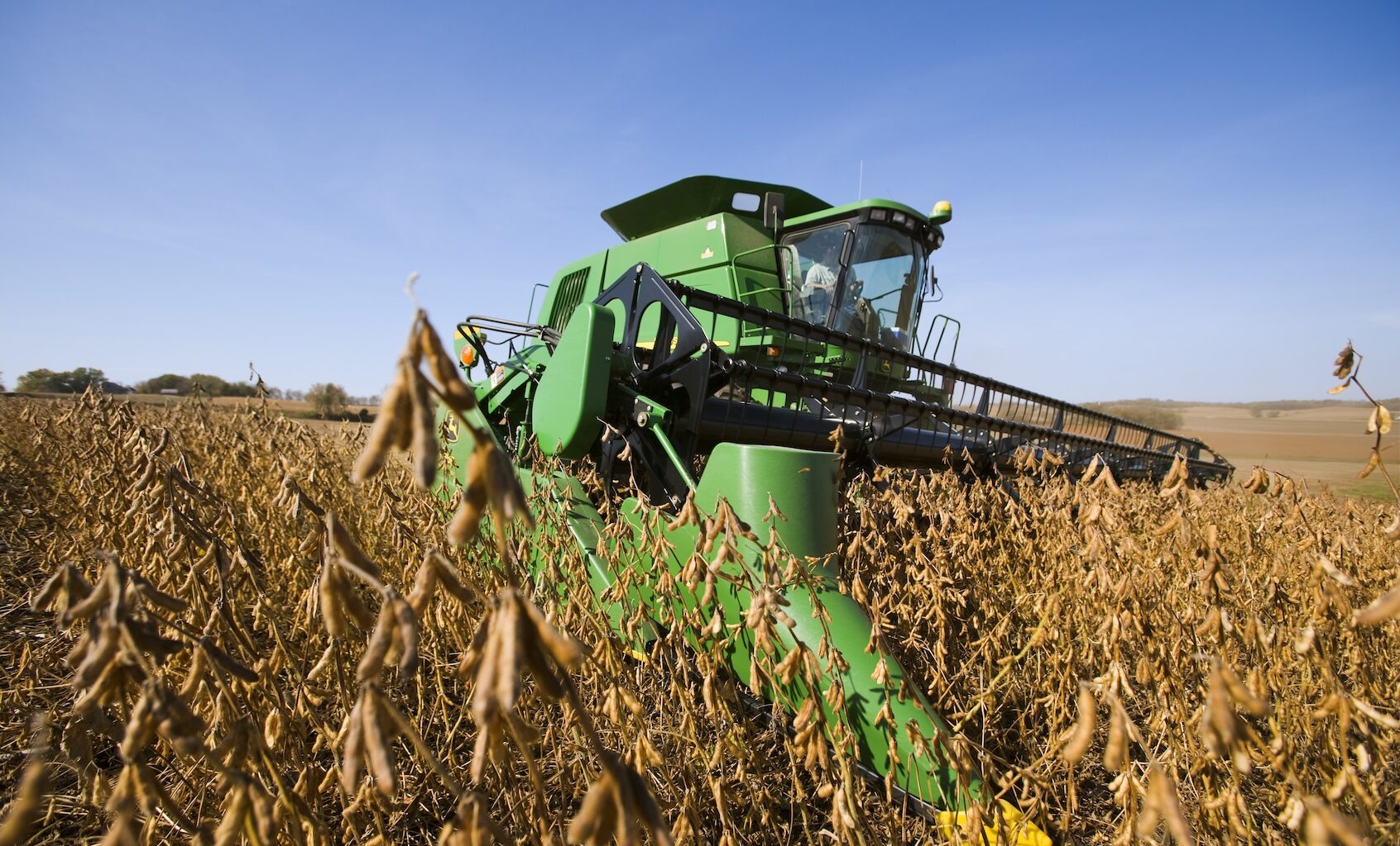 A John Deere combine harvests a healthy crop of soybeans in Autumn/near Northland, Minnesota. (Richard Hamilton Smith/Design Pics Editorial/Universal Images Group via Getty Images)